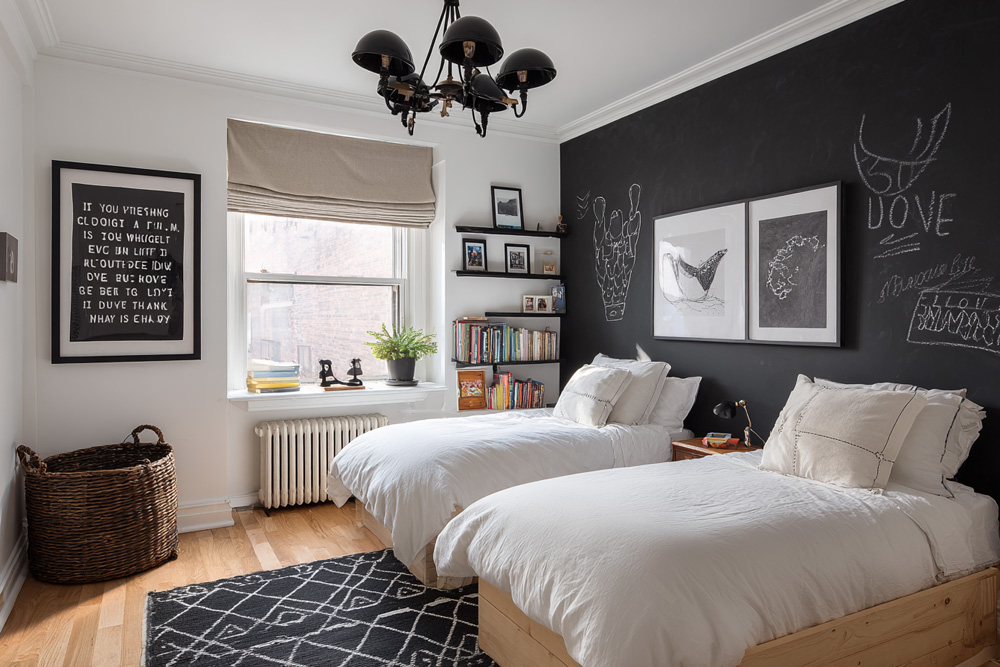 plat24941_a_bright_bedroom_features_a_bed_with_white_bedding_an_8f362062-6faf-4e1e-b3c0-64f8d6acbc64.jpg